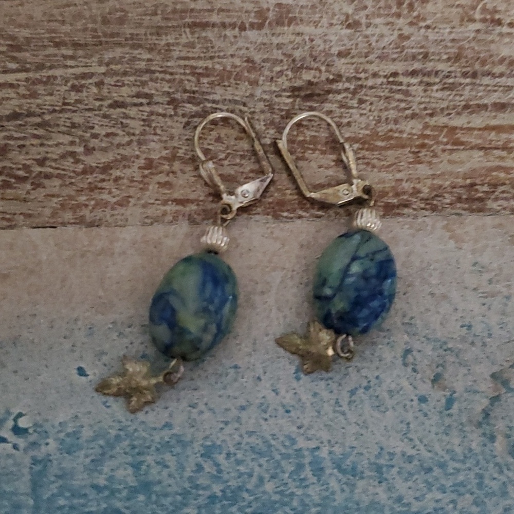Turquoise tone stone pierced drop earrings with little star
